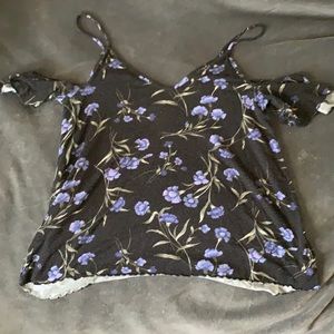 Cute tank top with shoulder detail.
